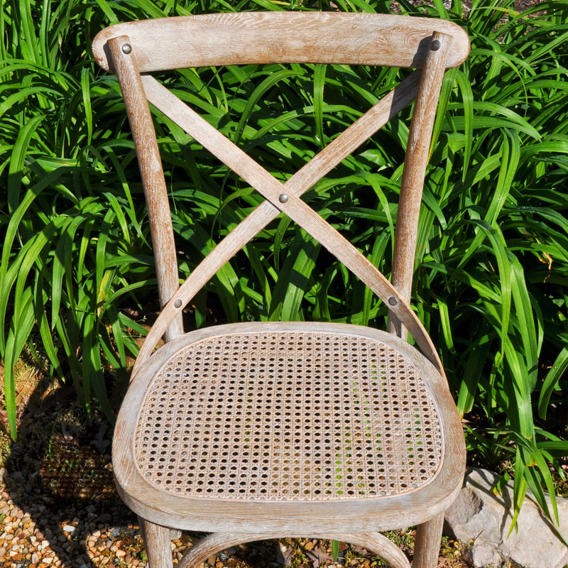pressed cane seat on Restoration Hardware chair