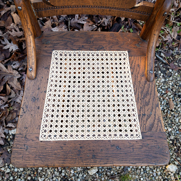 seven step hand caned seat on oak chair