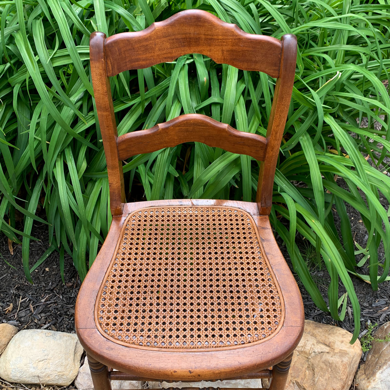 pressed cane seat stained to match original